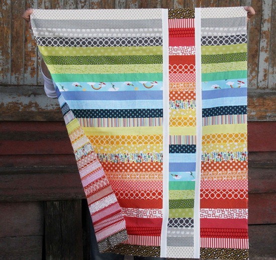 striped quilt in rainbow colors