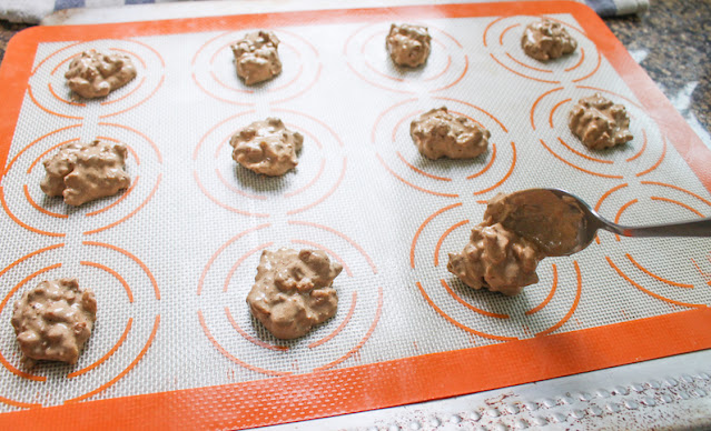 Dropping by heaped teaspoons on the prepared baking pan