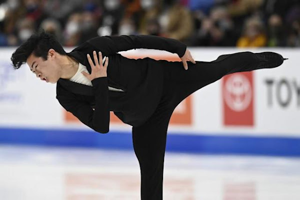 laborblog.my.id - American figure skater Nathan Chen skated to a gold in Beijing today. Wearing a dazzling constellation-themed top, he performed flawlessly to a medley that included Elton John's Rocket Man.