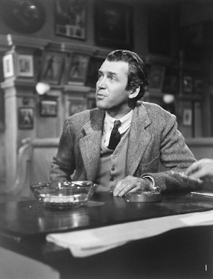 black and white photograph of actor James Stewart in profile on the set of the mobie "Harvey"