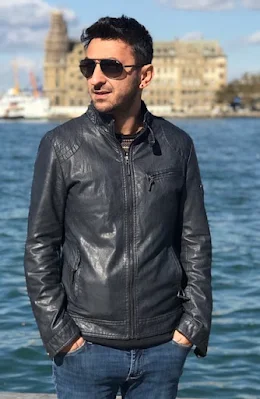 A Man Wearing Black Leather Jacket