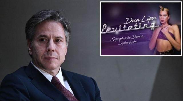 Antony Blinken and the cover of levitating of Dua Lipa in the background