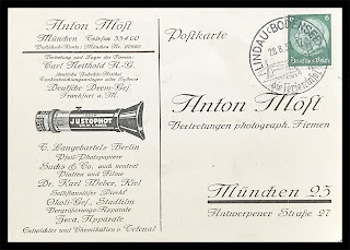 Illustrated postcard issued by Anton Möst, Munich, displaying the Justophot optical exposure meter—highlighting early photographic light measurement tools.