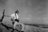 A 1936 photograph by Robert Capa, influenced by Gavroche character from Liberty Leading the People, The Falling Soldier.