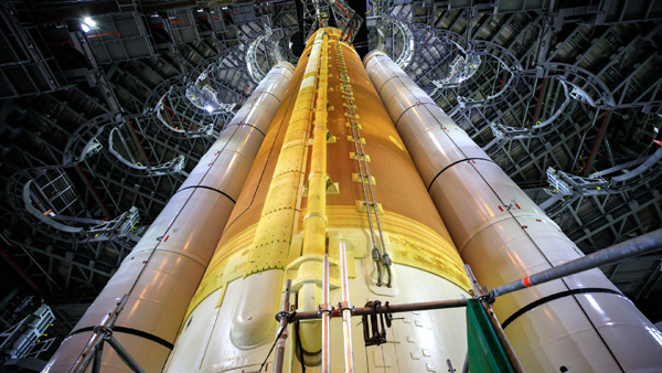 A low-angle view of NASA's Space Launch System rocket inside the Vehicle Assembly Building's High Bay 3 at Kennedy Space Center in Florida...on September 20, 2021.