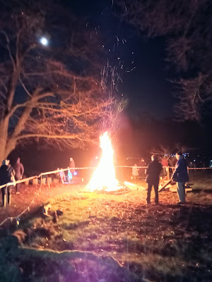 night time bonfire at the Orchard cordoned off with red and white tape