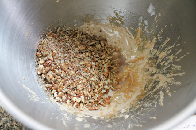 Folding in the pecans and vanilla