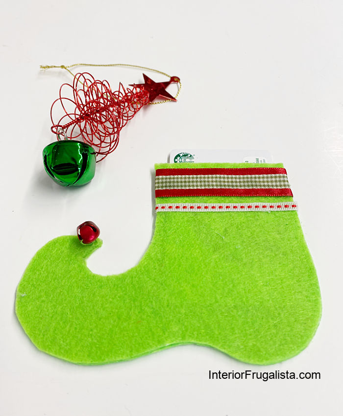 Green handmade felt elf shoe gift card holder for the holidays.