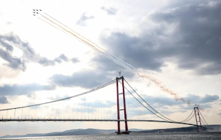 The longest suspension bridge in the world in western Turkey  The world's longest suspension bridge was completed in the Dadaners Strait in Canakkale, western Turkey, and the opening ceremony was held on the 18th. The distance between the two main towers, which indicates the scale of the suspension bridge, reached 2023 meters, overtaking the Akashi Kaikyo Bridge, which connects Kobe City and Awaji City in Hyogo Prefecture, which was the largest in the world. Built by the Turkish-Korean business alliance, the opening ceremony was attended by President Erdogan and South Korean Prime Minister Kim Bu-gyeom.  The Dardanels Strait, along with the Bosphorus Strait, is a strategic point for maritime transportation that connects the Mediterranean Sea and the Black Sea. The total length of the suspension bridge that opened is about 3.6 km, and a highway with three lanes on each side connects Europe and Asia. The Akashi Kaikyo Bridge has a total length of about 3.9 km, and the distance between the two main towers is 1991 meters