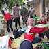 Anggota Koramil Sambungmacan Door to door Dampingi Vaksinasi Lansia 