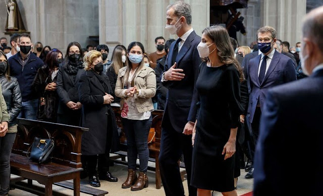 Queen Letizia wore a black bow sleeve sheath dress from Carolina Herrera. The Galician fishing vessel Villa de Pitanxo