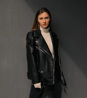 A Fashionable Girl Wearing Black Leather Jacket