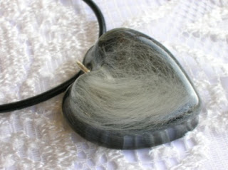 Coloured resin pendant with white hair