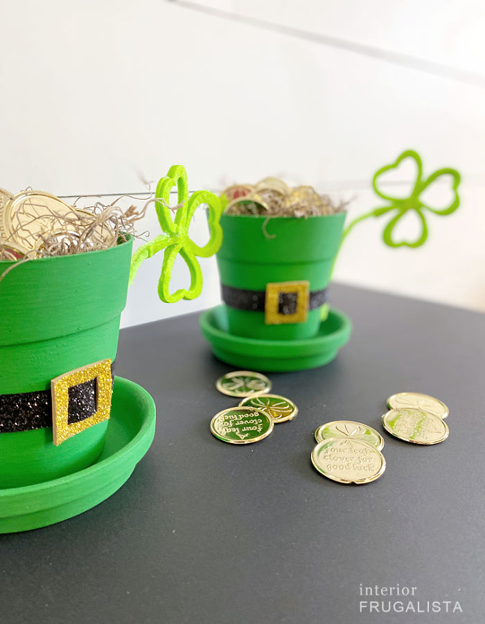 How to turn small flower pot and saucers into adorable leprechaun hats for St. Patrick's Day.
