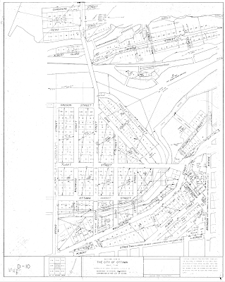 City of Ottawa survey plan map showing LeBreton Flats from Broad to Bronson, north of Albert Street (including Chaudière and Victoria Islands. Property parcels are numbered, and some streets have little notes about the former names of the streets and/or bylaw numbers that apply to the street.
