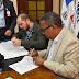 Doctor Edgar Augusto Féliz Méndez, director de Comedores Económicos firma acuerdos con director del CND, y de coordinador de Comisión de Fomento a la Tecnificación del Sistema Nacional de Riego.