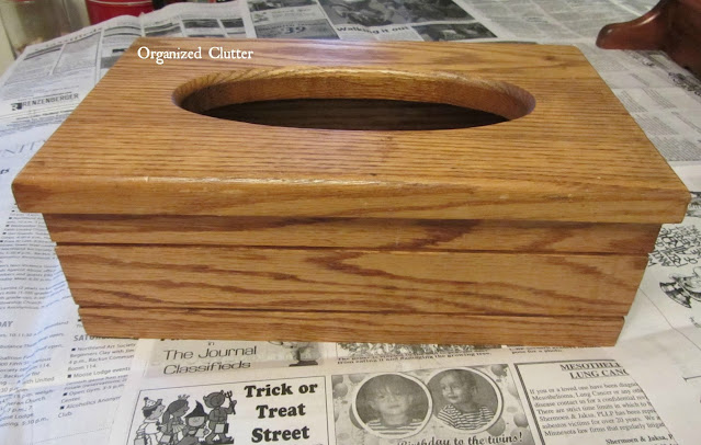 Photo of an oak thrifted tissue box holder.