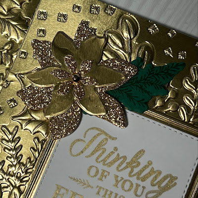 Poinsettias going fili and metallic speciality paper  die cut flower  on a Christmas Card using Stampin' Up! Merriest Moments Stamp and Die Bundle