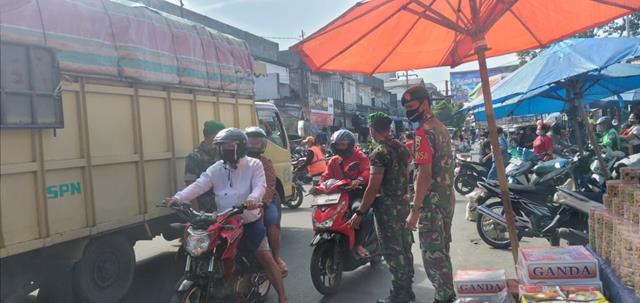 Patroli Masker Di Pasar Dwikora Parluasan Dilakukan Personel Jajaran Kodim 0207/Simalungun