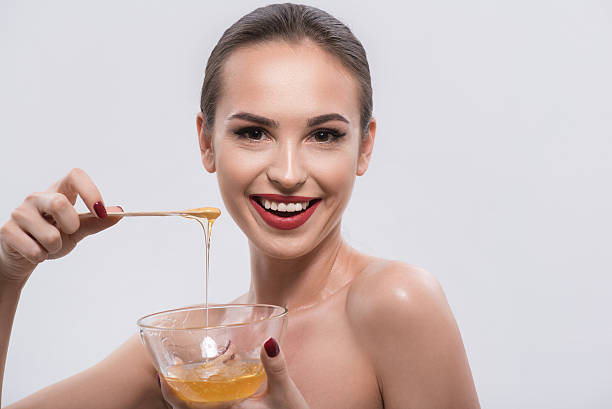 Woman use Honey for Beauty Skin