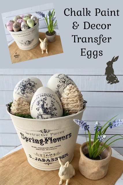 Photo of large paper mache eggs chalk painted and decorated with decor transfer labels from Redesign with Prima.