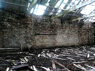 <img src="edenwood mill.jpeg" alt="derelict mill near edenfield lancashire interior of workshop">