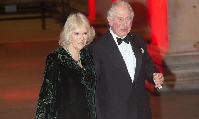 The Duchess of Cornwall wore a green kaftan-style embroidered dress. She wore green trousers and a emerald necklace