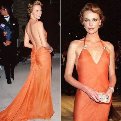 Charlize Theron wore a backless orange gown