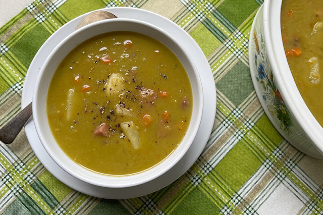 Food Lust People Love: This hearty ham and split pea soup is flavorful and satisfying. Made with a smoked hambone, split peas, potatoes and carrots, it’s a full meal soup!