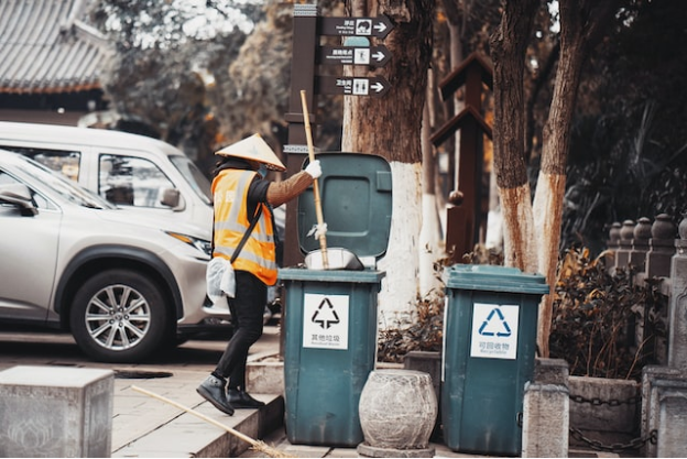 A sanitation worker on duty after clearing the NYC sanitation exam