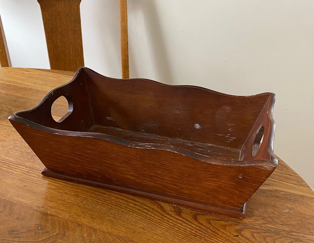 Photo of a vintage wooden midcentury tray.