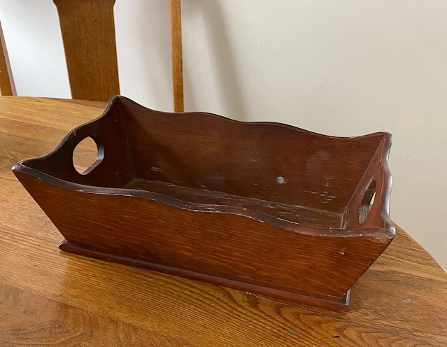 Photo of a vintage wooden midcentury tray.