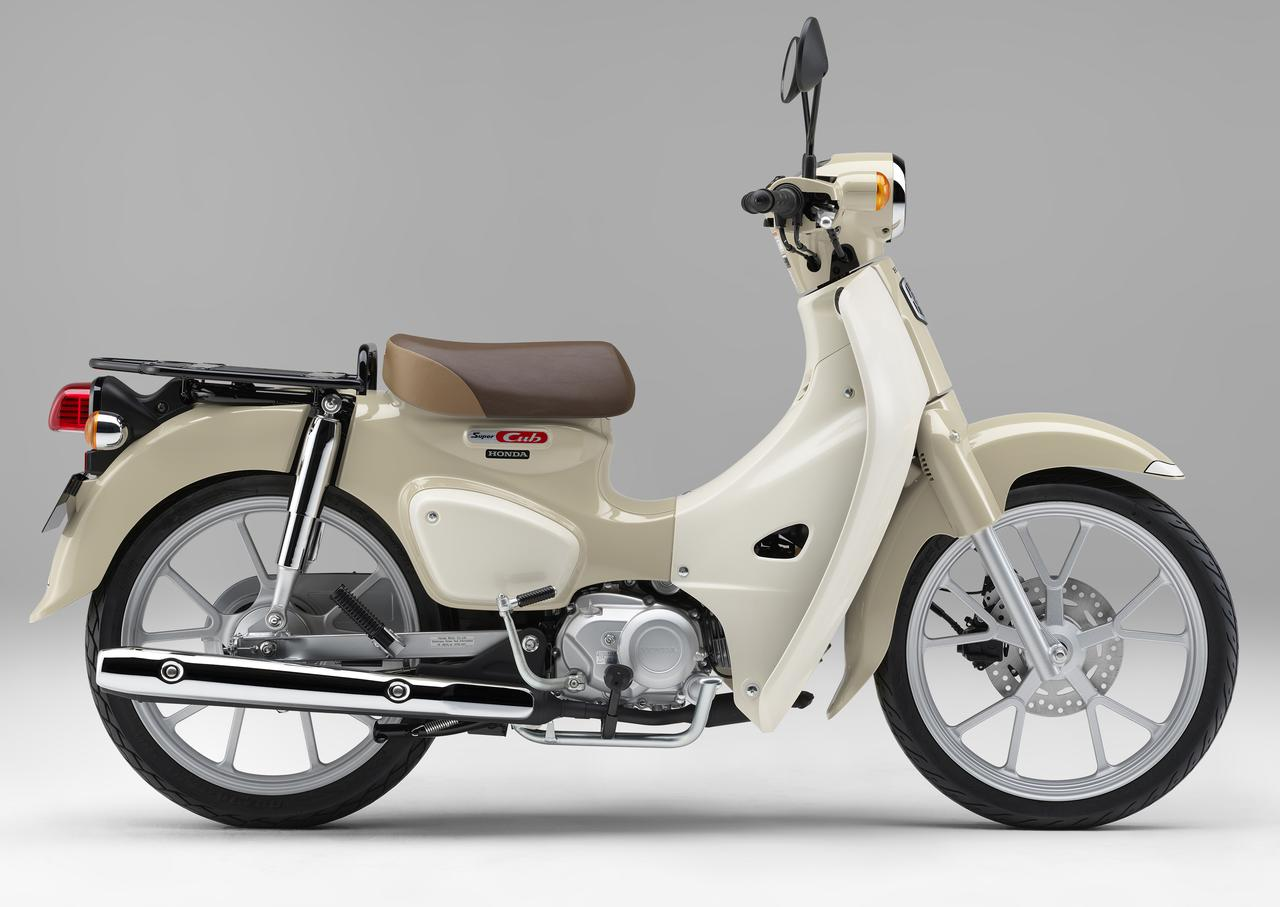Honda has officially launched the 2022 version of the super classic motorcycle family, the Super Cub 110 version 2022 in Japan recently. that remains the same identity as the previous version But there are some details that differ in a very interesting way.  For the Honda Super Cub 110 2022, it will have a round headlamp design similar to the original Super Cub family, but the type of wheels has been changed from 17-inch front and rear wheels from wire spokes to aluminum alloy wheels instead. Including the tires have been changed to tubeless (tubeless), and the seat has been changed from the previous version. The front drum brake system was changed to disc brakes. Including the installation of an ABS brake system to come with.  while the power of the bike It has changed from the original. Although it still comes in the 109cc single-cylinder, 4-stroke SOHC, it has a new stroke of 47.0 x 63.1 mm (from 50.0 x 55.6 mm) to a maximum of 8 PS and has been added. More torque than ever. air cooled engine Seat height 738 mm. The weight of the bike is 101 kg. The bike has also adjusted the display details of the new screen as well.  have to wait to follow that In Thailand, will we have to upgrade according to Japan or not? if there is progress We will hurry to update you soon.