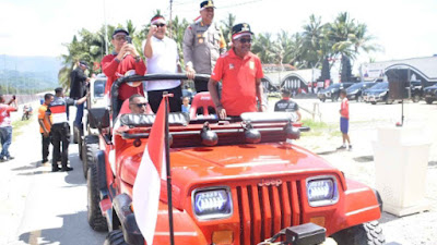 Rayakan Hari Integrasi Papua ke NKRI, Kapolresta Hadiri Giat Pembentangan Bendera Merah Putih Sepanjang 11 KM