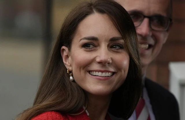 Kate Middleton wore a textured double breasted blazer by Zara. ME+ EM frill layering top. Maria Black mother-of-pearl earrings