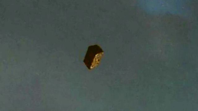 Square UFO caught on camera.