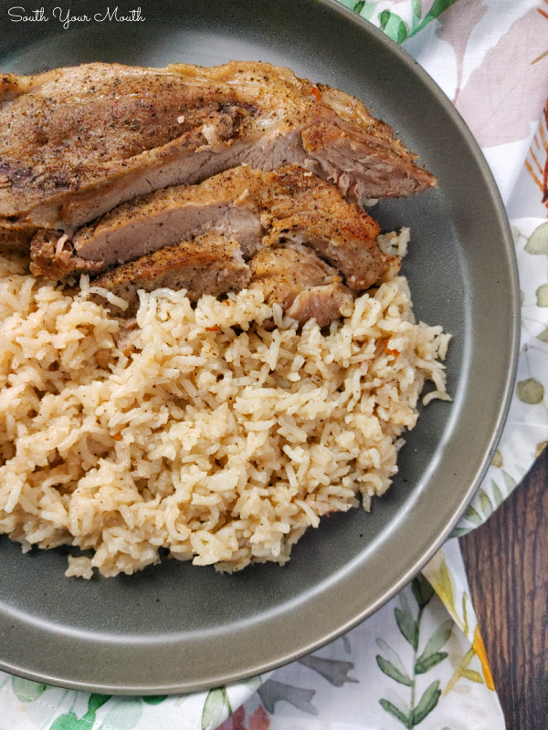 Baked Country-Style Ribs & Rice - A simple recipe for tender country-style pork ribs baked over a bed of perfectly seasoned rice.