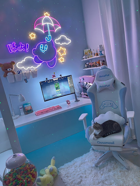 A blue otaku room with gumball vending machine a white Cinnamoroll gaming chair and Kirby LED lights