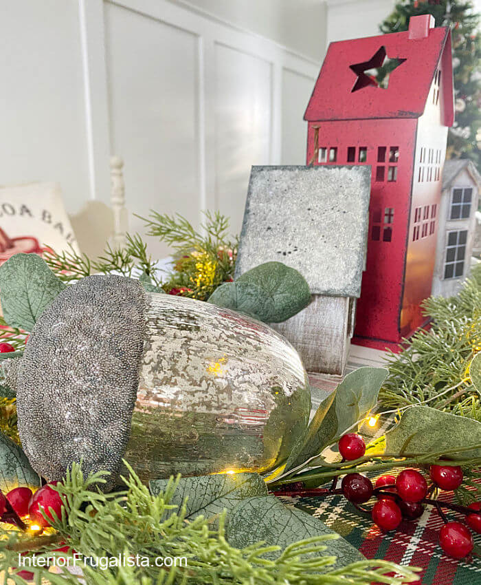 How to turn dollar store bird houses into adorable wood Scandi houses with DIY galvanized roofs for an easy five minute Christmas table centerpiece.