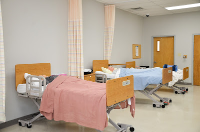Caption: These beds and other equipment help simulate working in a long-term healthcare facility.