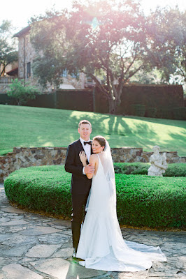 bride and groom smiling