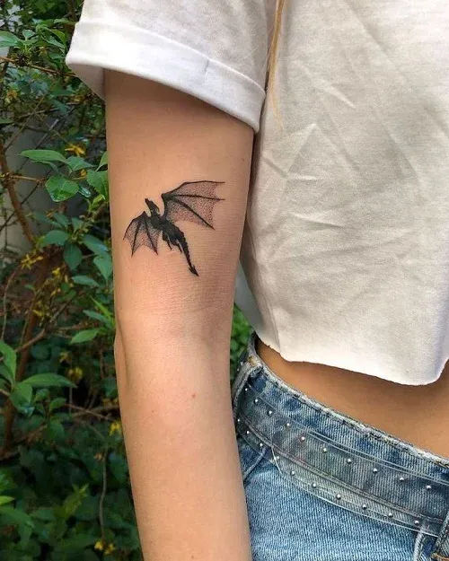 colour tattoo on dark skin