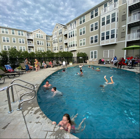 People in pool at SouthField Commons