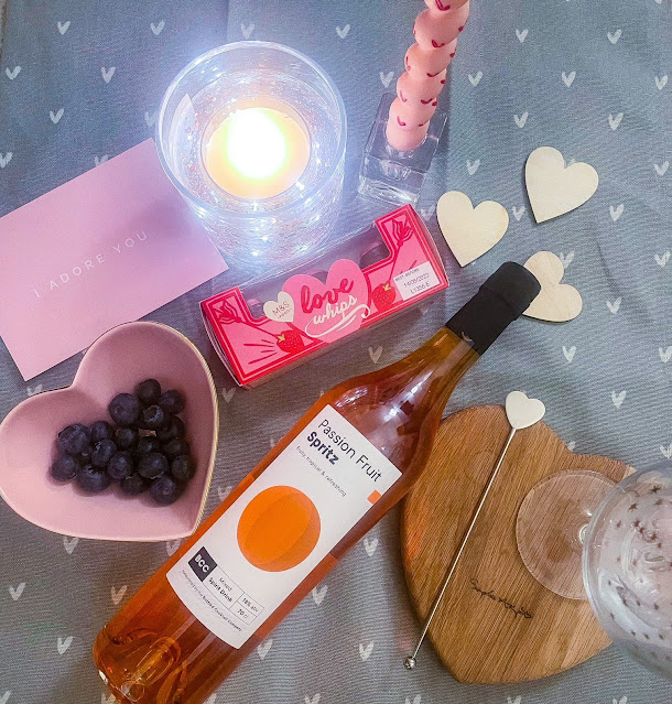 Flat Lay of Valentines Themed Picnic with Bottled Cocktail Company Cocktail