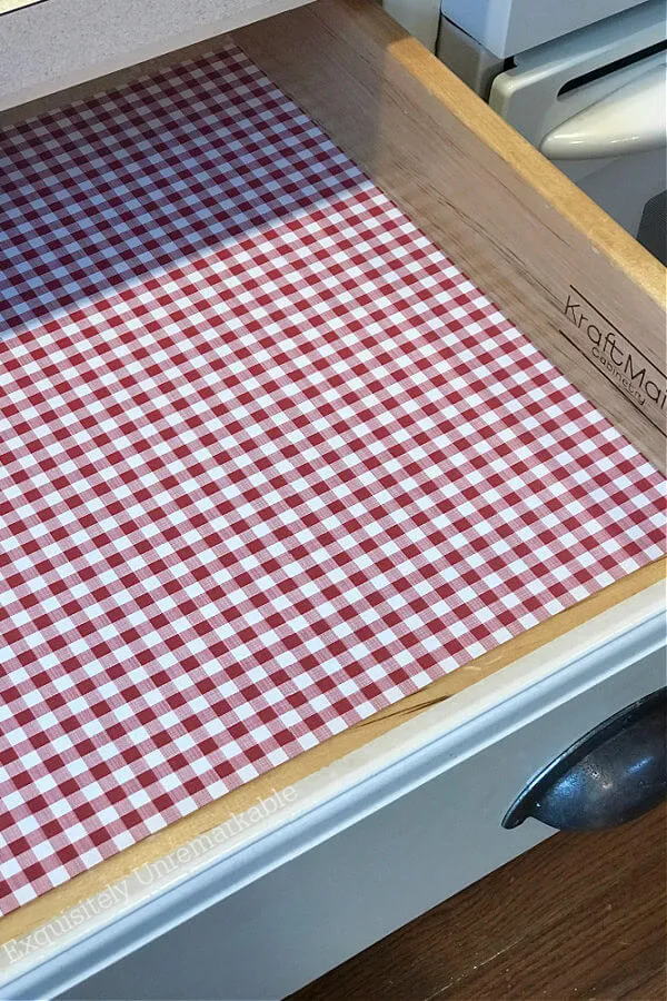 Red and white contact paper in a drawer