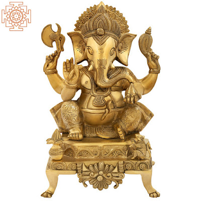 Ganesha Brass Statue Seated on a Designer Chowki