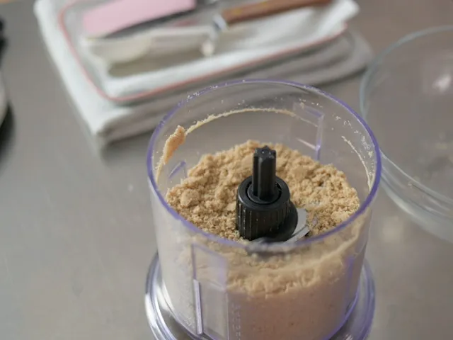 Process digestive biscuits in food processor to fine crumbs