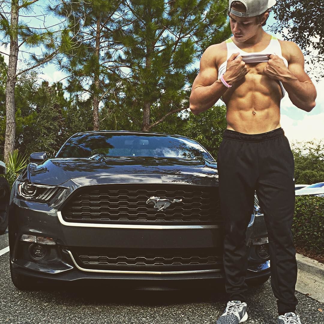 cocky-rich-young-guy-abs-black-car