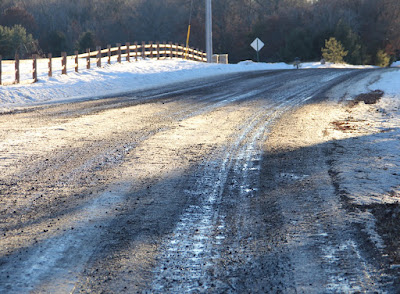 a township gravel road in winter