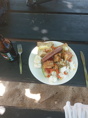 My plate of " Buffet Lunch" with beer after excellent snorkelling on " SCHOONER ISLAND ".